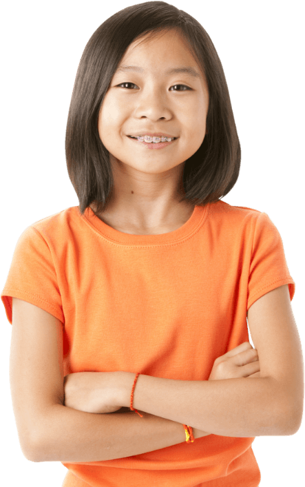 Little girl with braces smiling with her arms crossed
