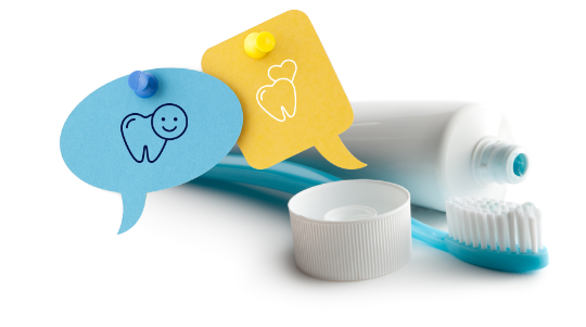 Toothpaste and a toothbrush with papercraft speech bubbles next to them.